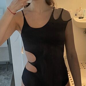 AREA NWOT black cut out body suit